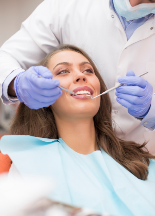 Dentist talking to patient